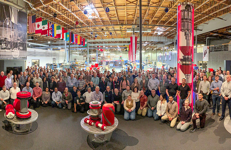 Group photo of employees from around the world gathered together