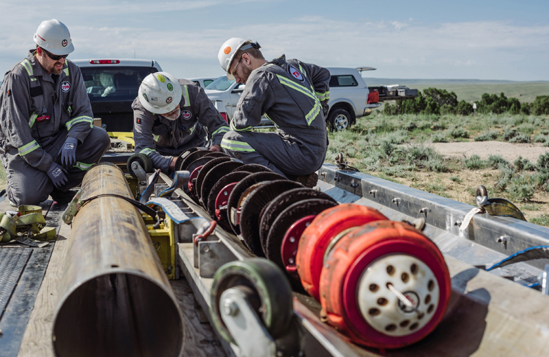 Pipeline integrity technicians preparing to launch an inline inspection tool in the field
