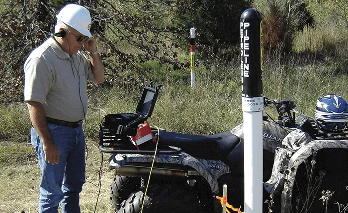 Response team technician using detection tools to locate and remove a stuck pig
