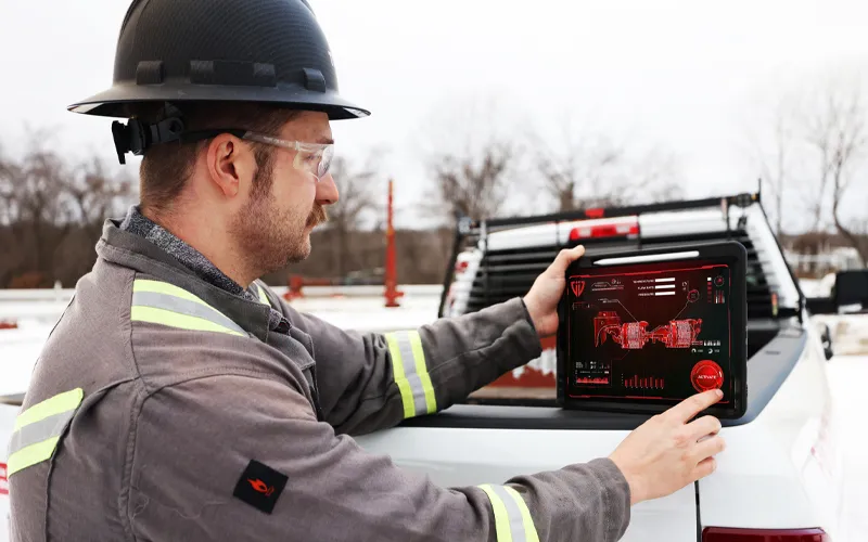 Man at back of white truck